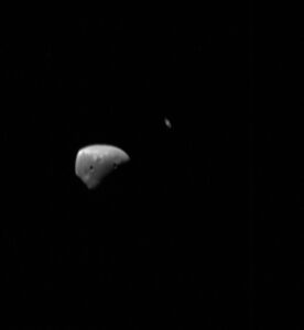 Deimos and Saturn from Mars Express