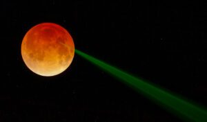 laser shot during lunar eclipse