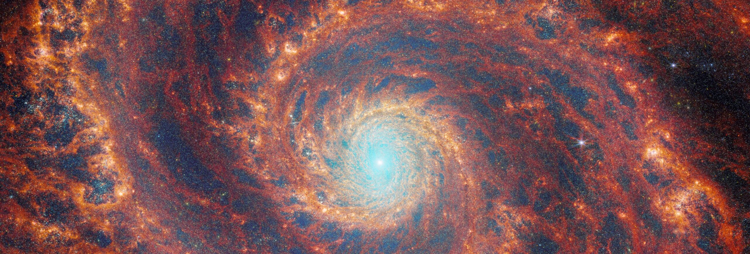 false-color infrared image of galaxy M51 by james webb space telescope