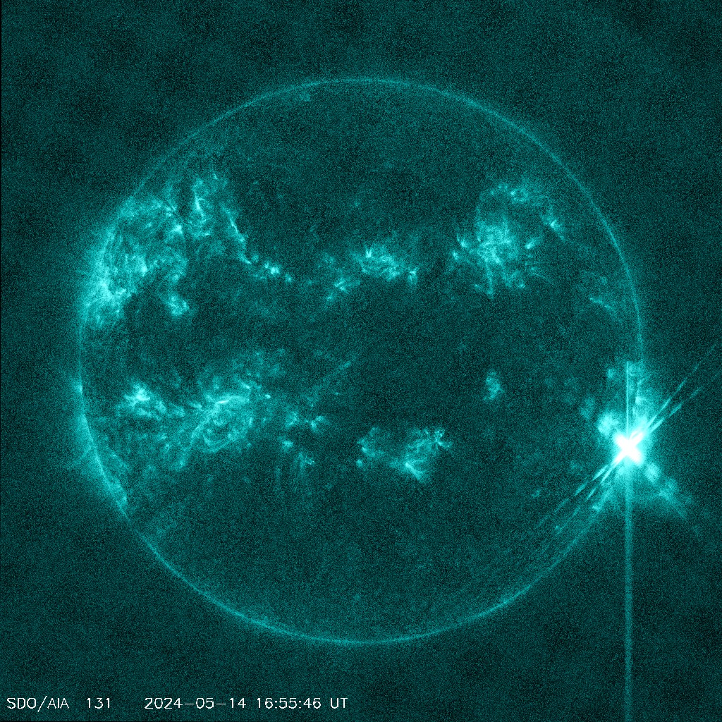 An image of the sun shows a powerful solar flare